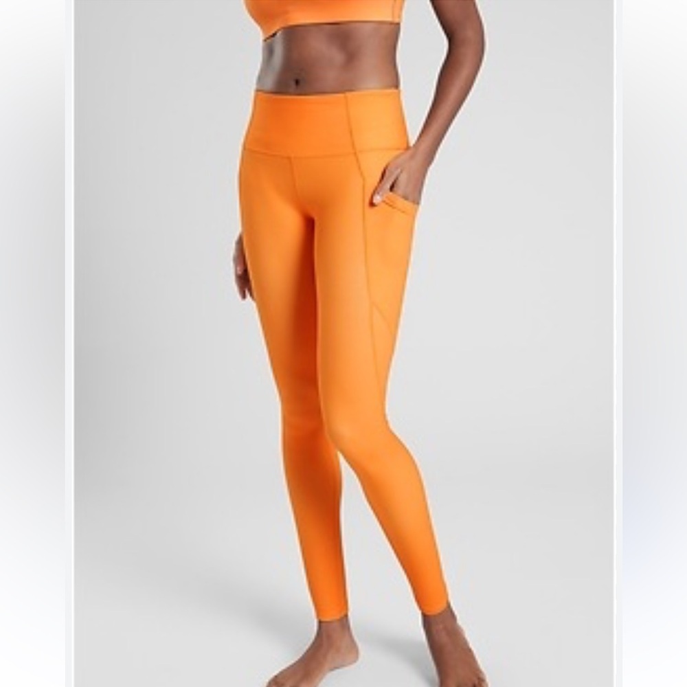 ATHLETA SALUTATION STASH POCKET TIGHT